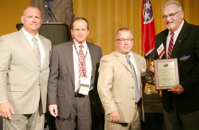 Averitt Express was recently honored by the Tennessee Trucking Association with its 2016 Clean Diesel Award as well as its 2016 Fleet Safety Award. Accepting the honors on behalf of Averitt Express are director of safety and compliance John Walton (second from left), and driving associate Robert Crabtree (right), who also serves as a TTA Road Team Captain.